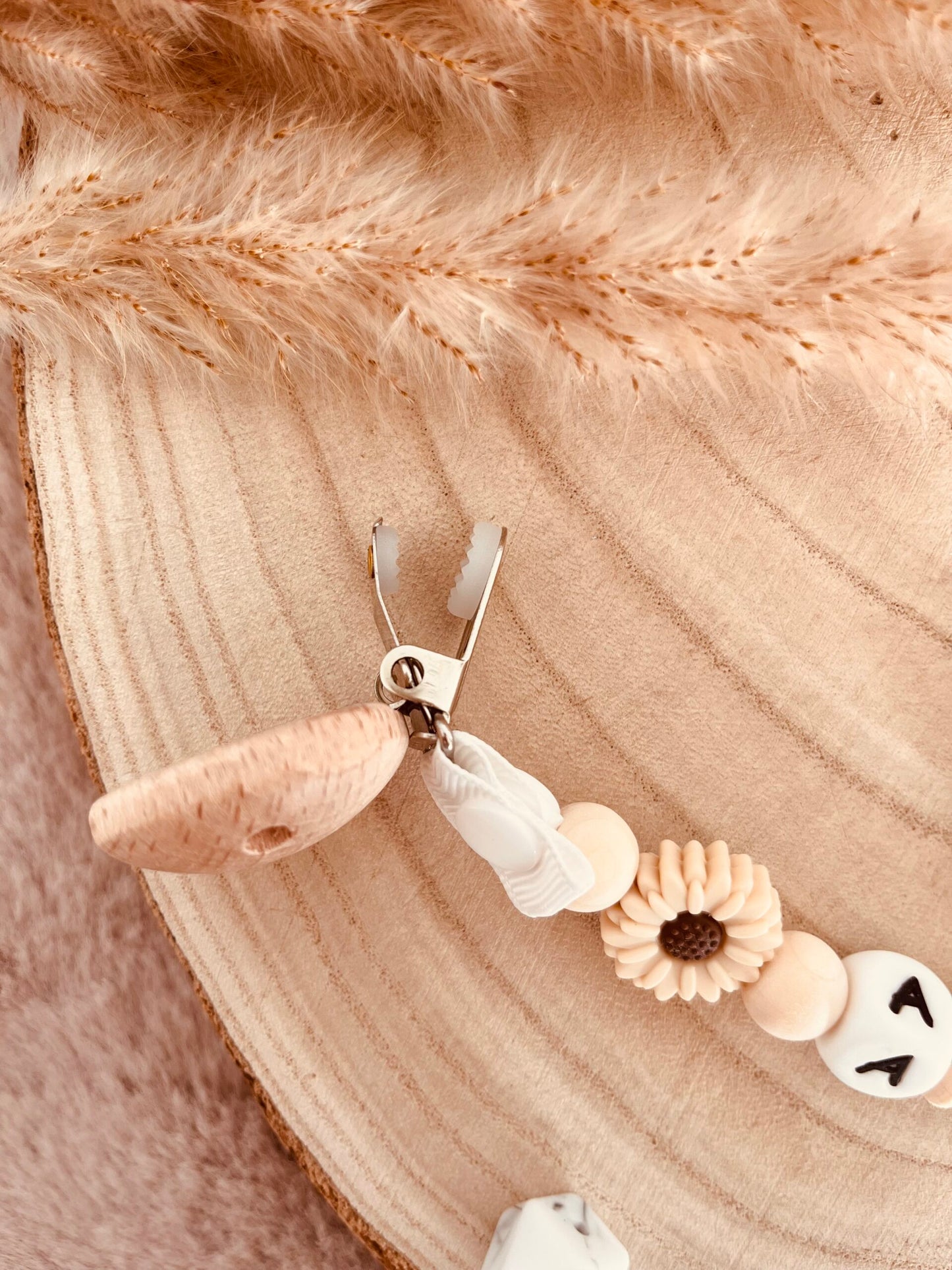 Attache doudou marguerite beige