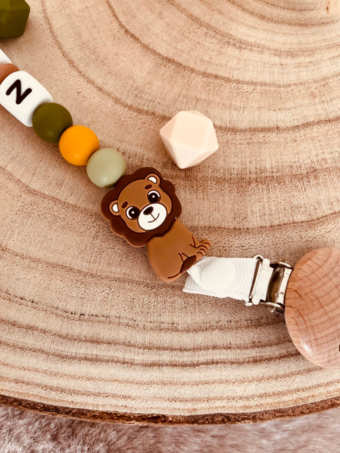 Attache doudou lion