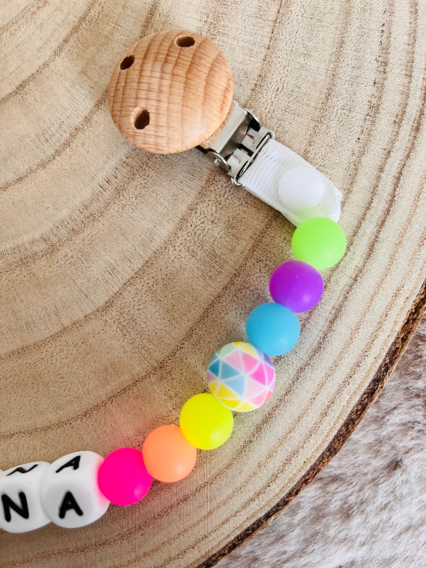attache doudou fluorescent