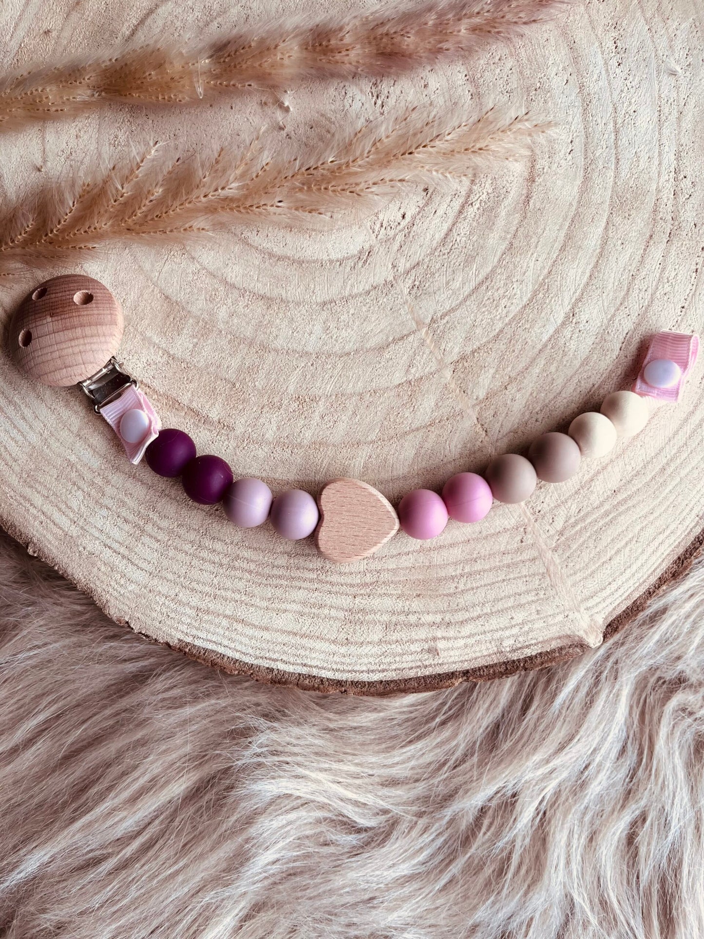 Attache tétine vieux rose