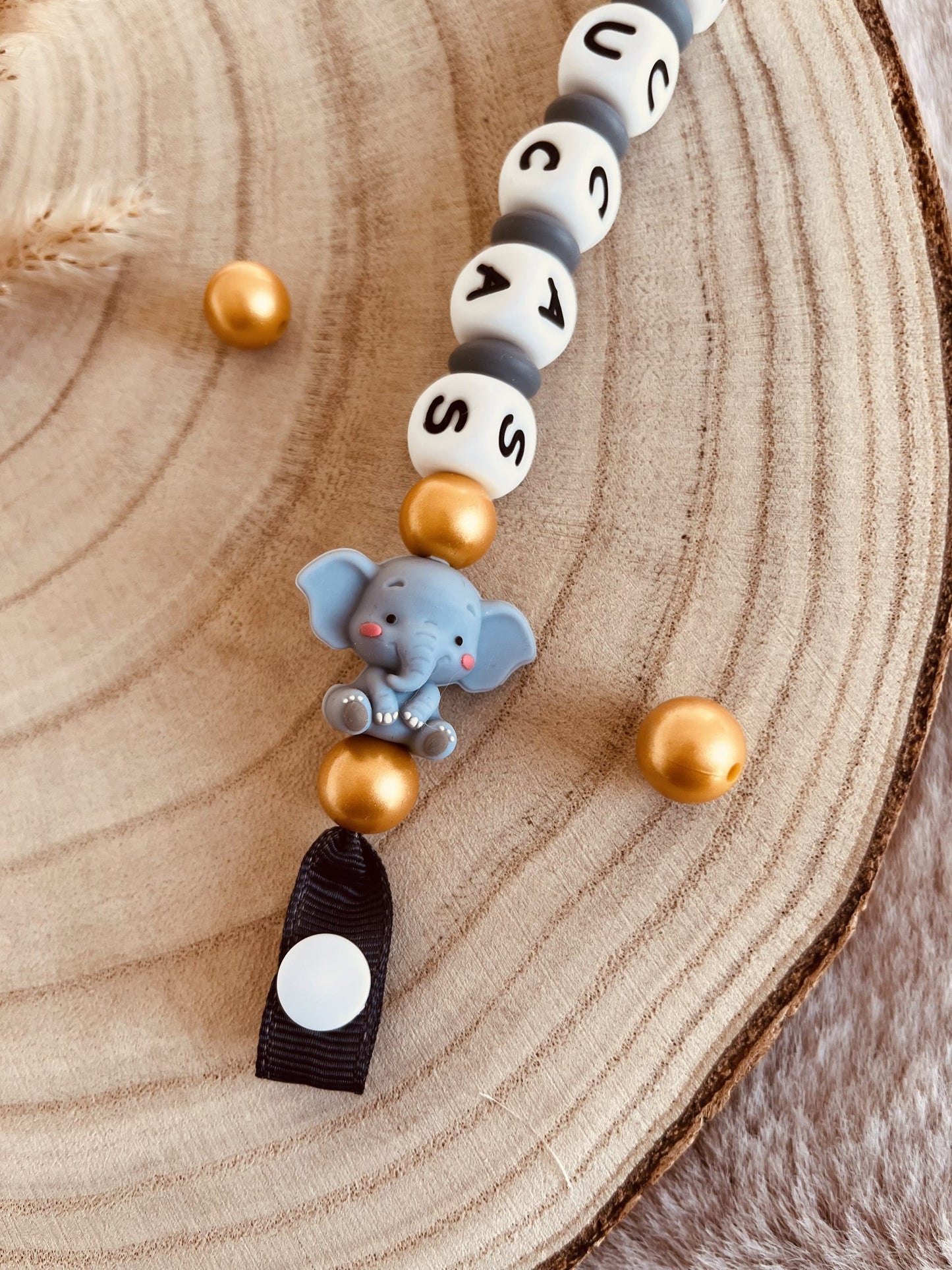 Golden elephant tie