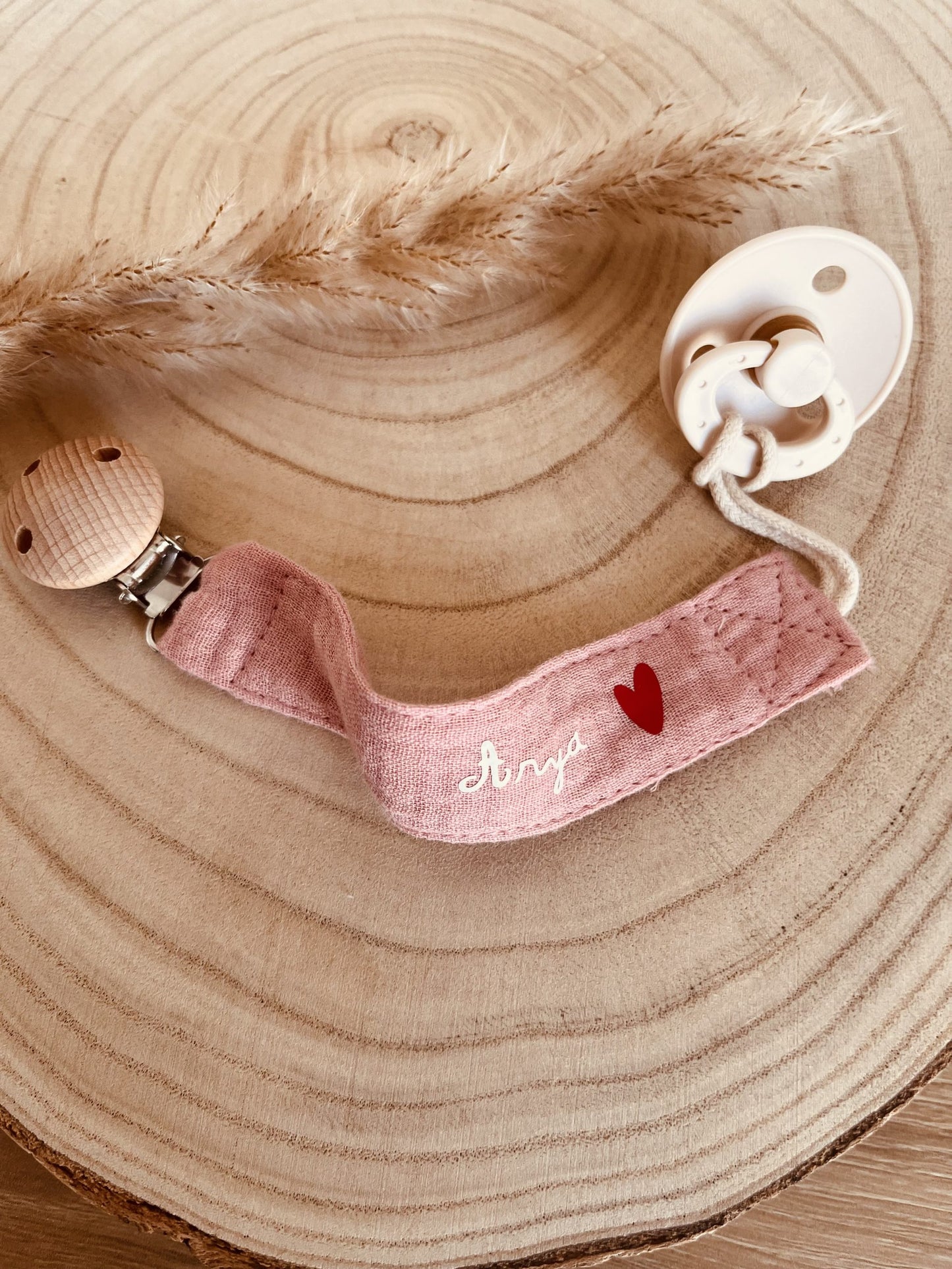 Pink cotton gauze pacifier attachment