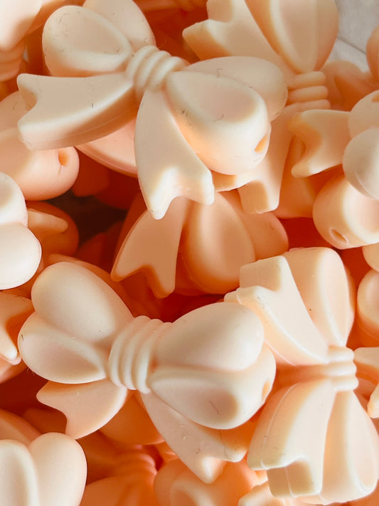 Perle silicone noeud beige