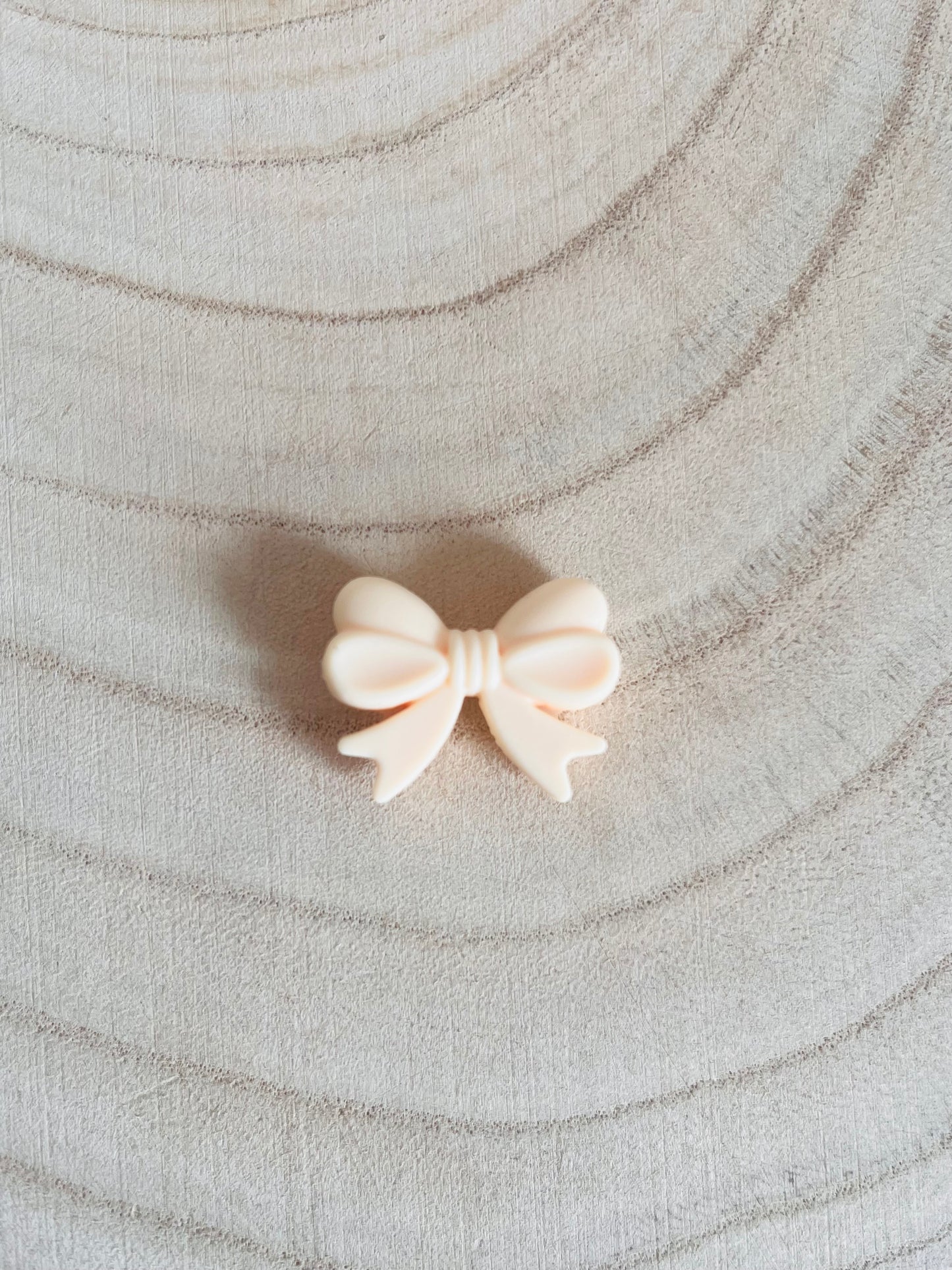 Perle silicone noeud beige