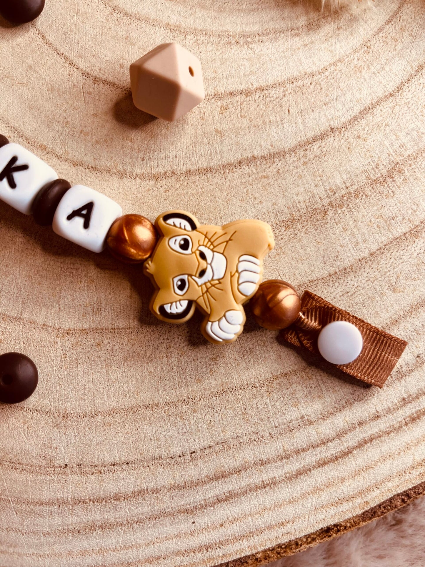 Attache tétine le roi lion simba