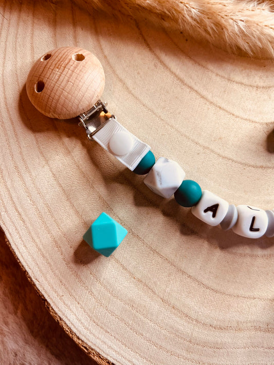 Attache tétine pâquerette verte