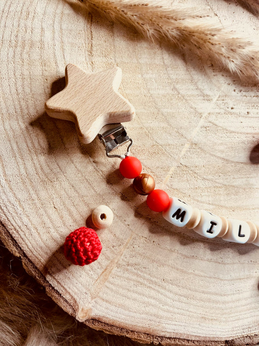 attache tétine père noel