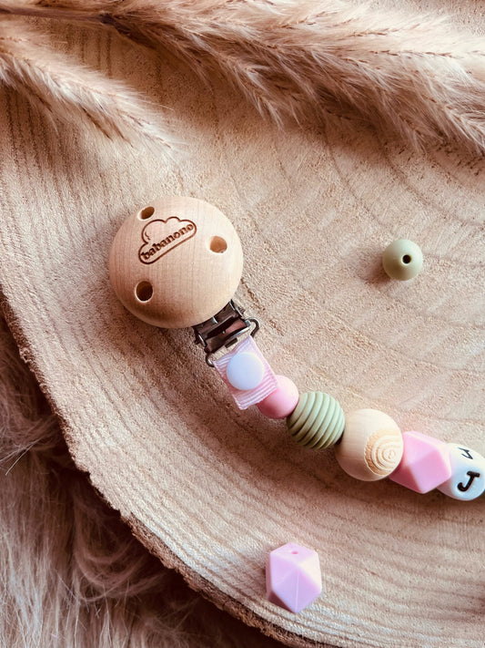 Attache tétine rose et kak