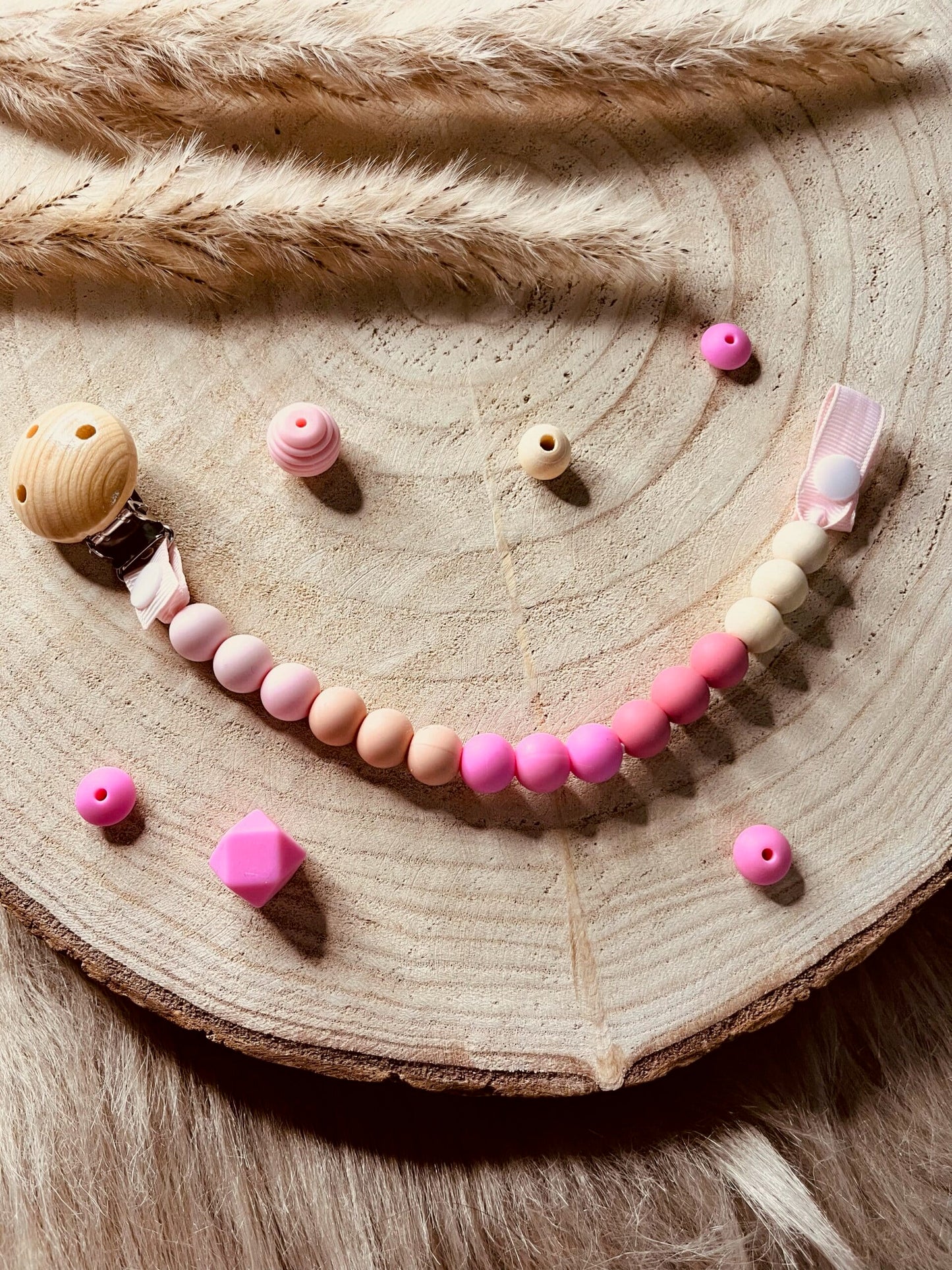 Attache tétine dégradé rose