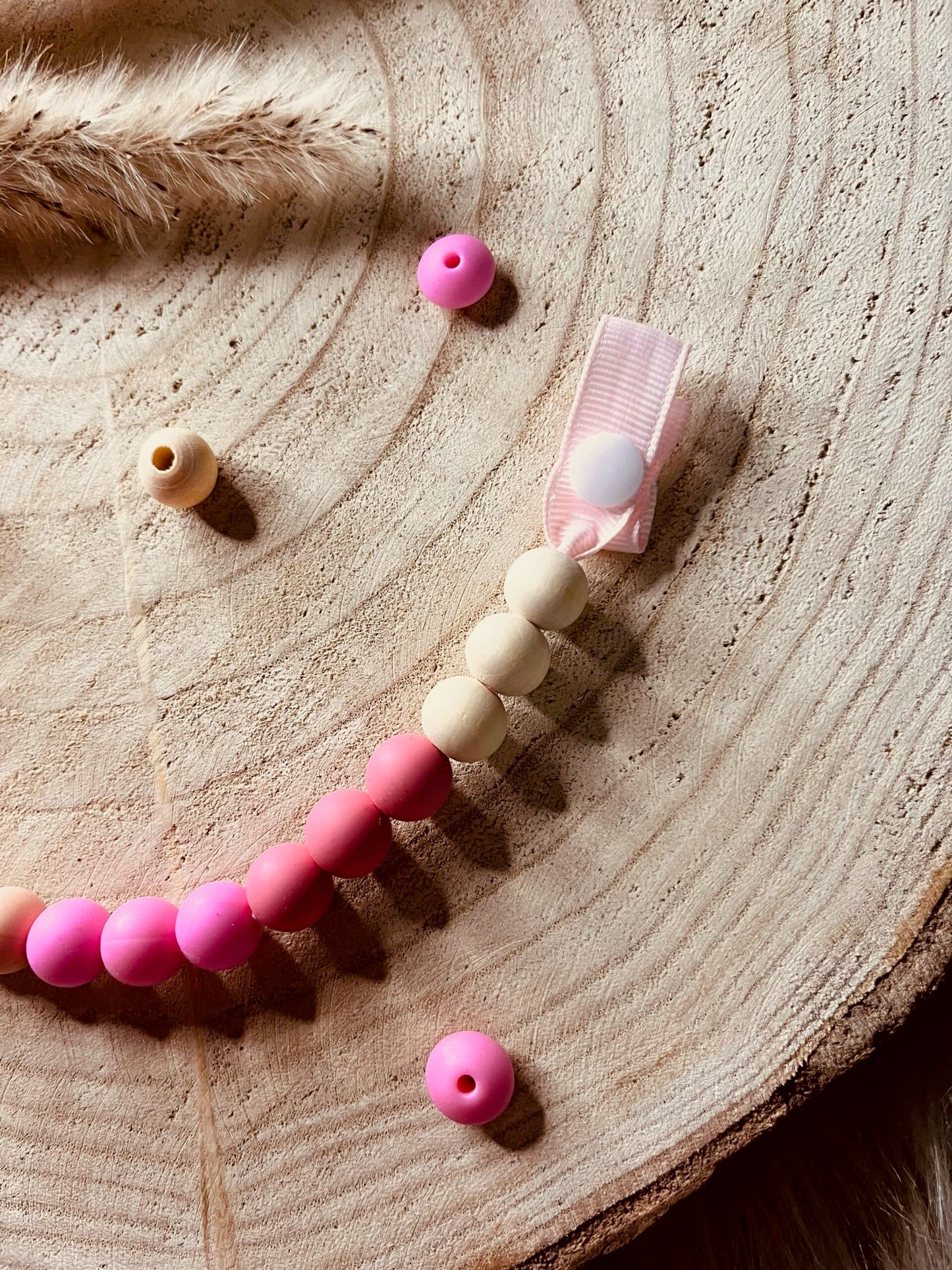 Attache tétine dégradé rose