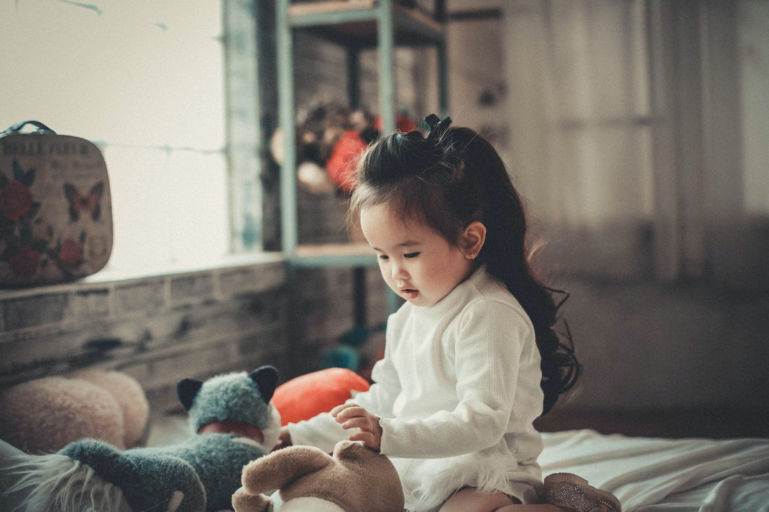 photography of a baby girl playing|photography of a baby girl playing