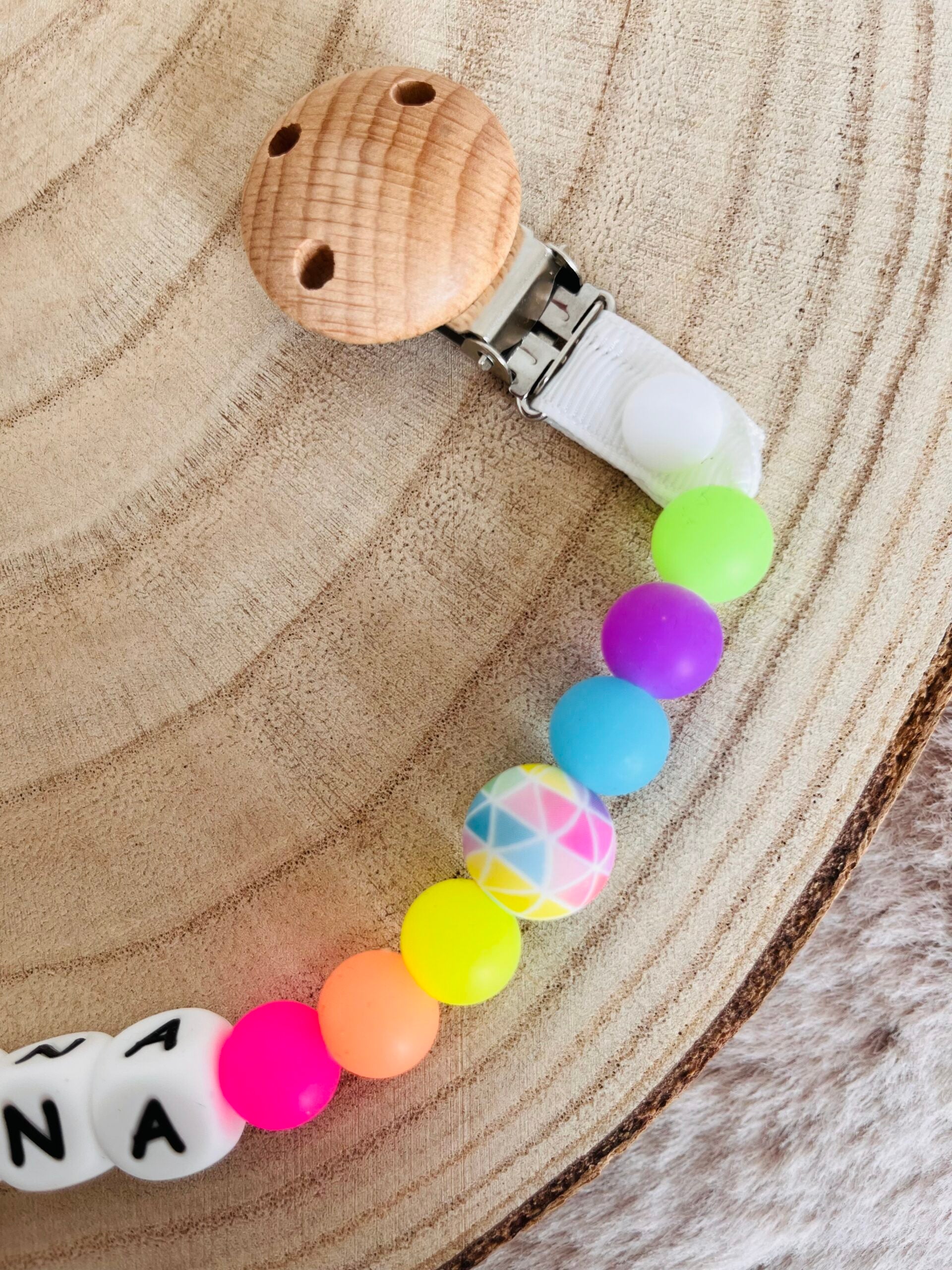attache doudou fluorescent