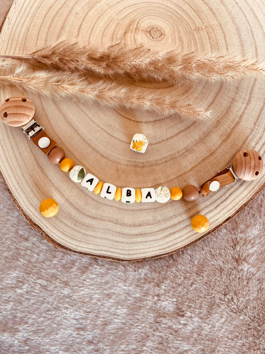 Attache doudou tournesol