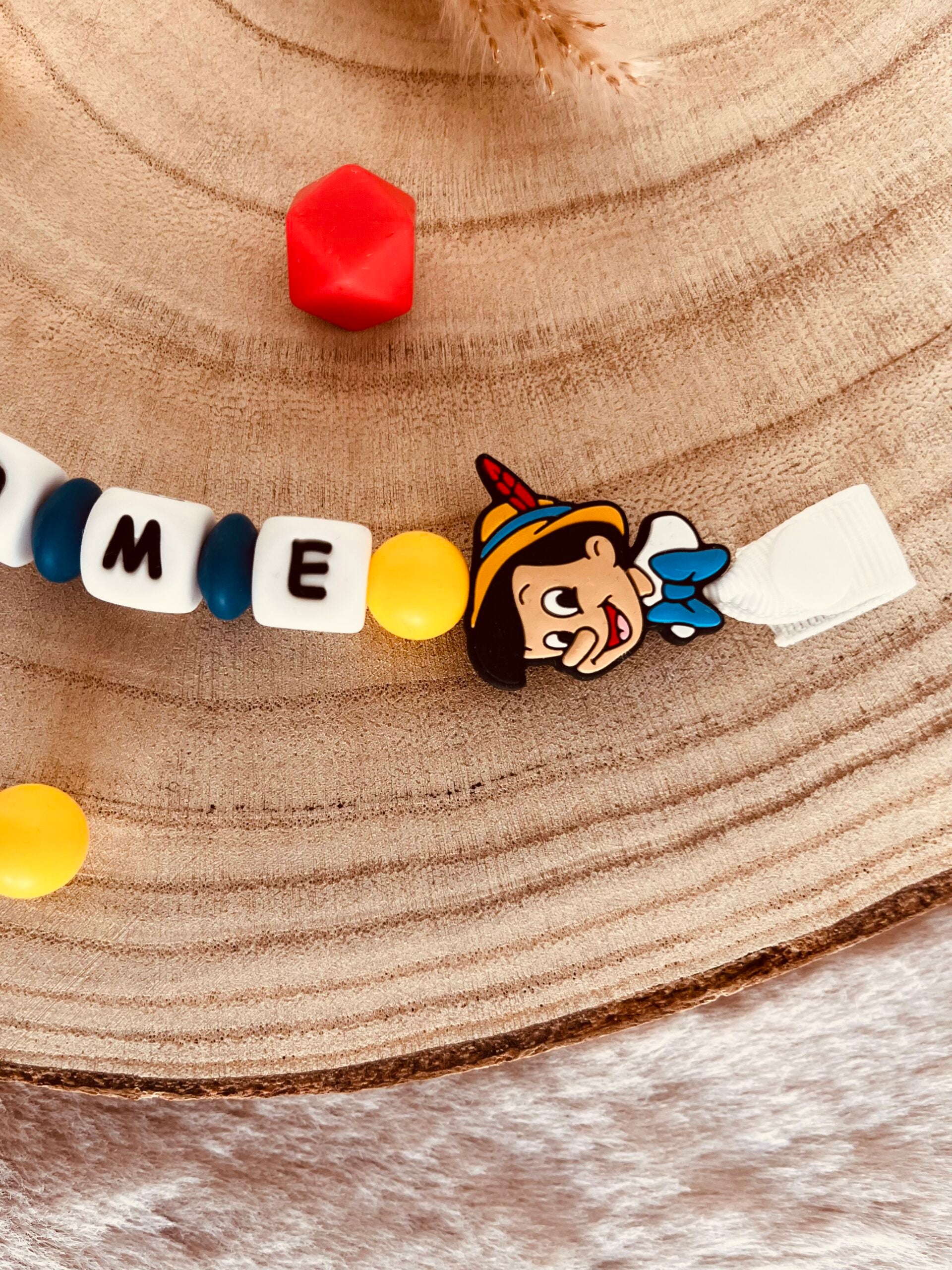 Attache tétine Pinocchio
