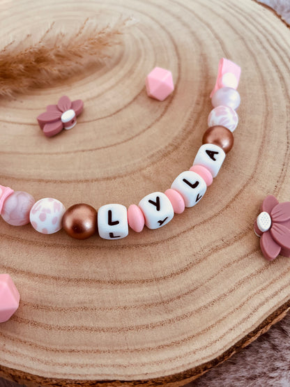 Attache-tétine personnalisée léopard rose