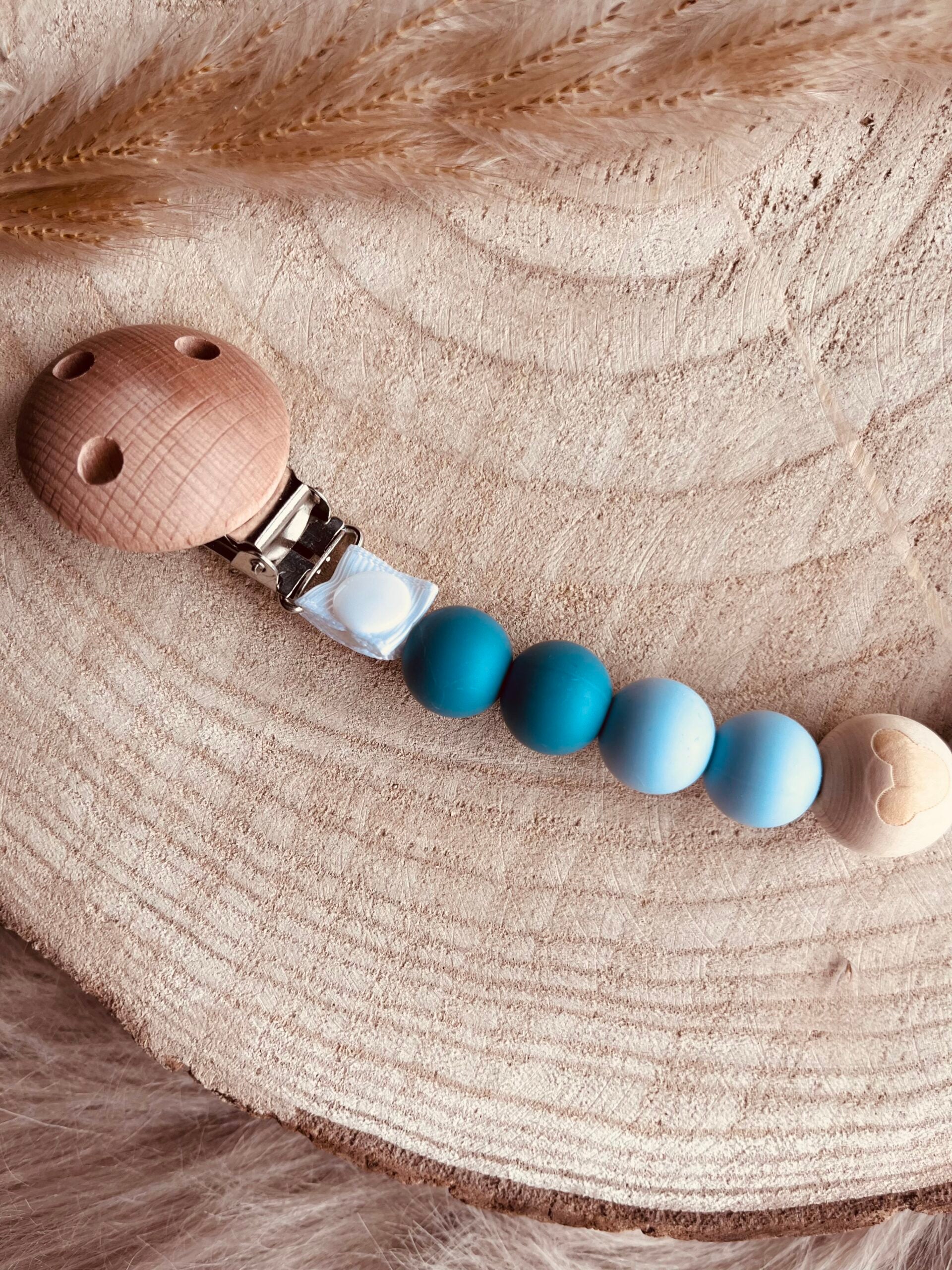Attache tétine bleu