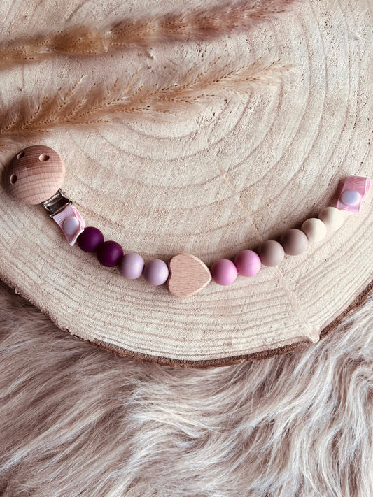 Attache tétine vieux rose