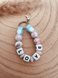 Porte clé personnalisé rose poudré
