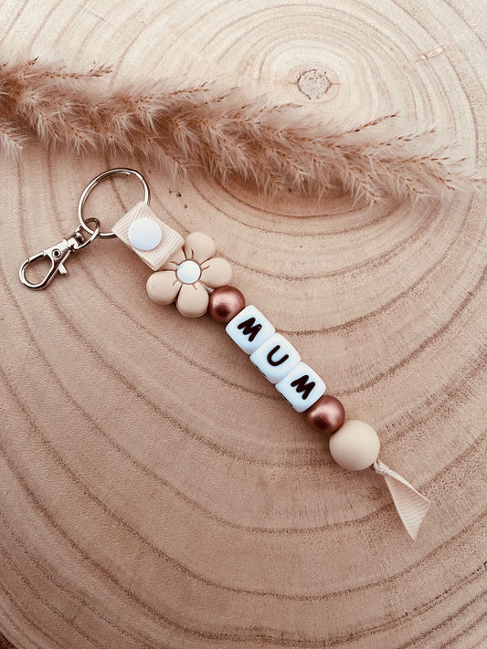 Porte clé personnalisé marguerite beige