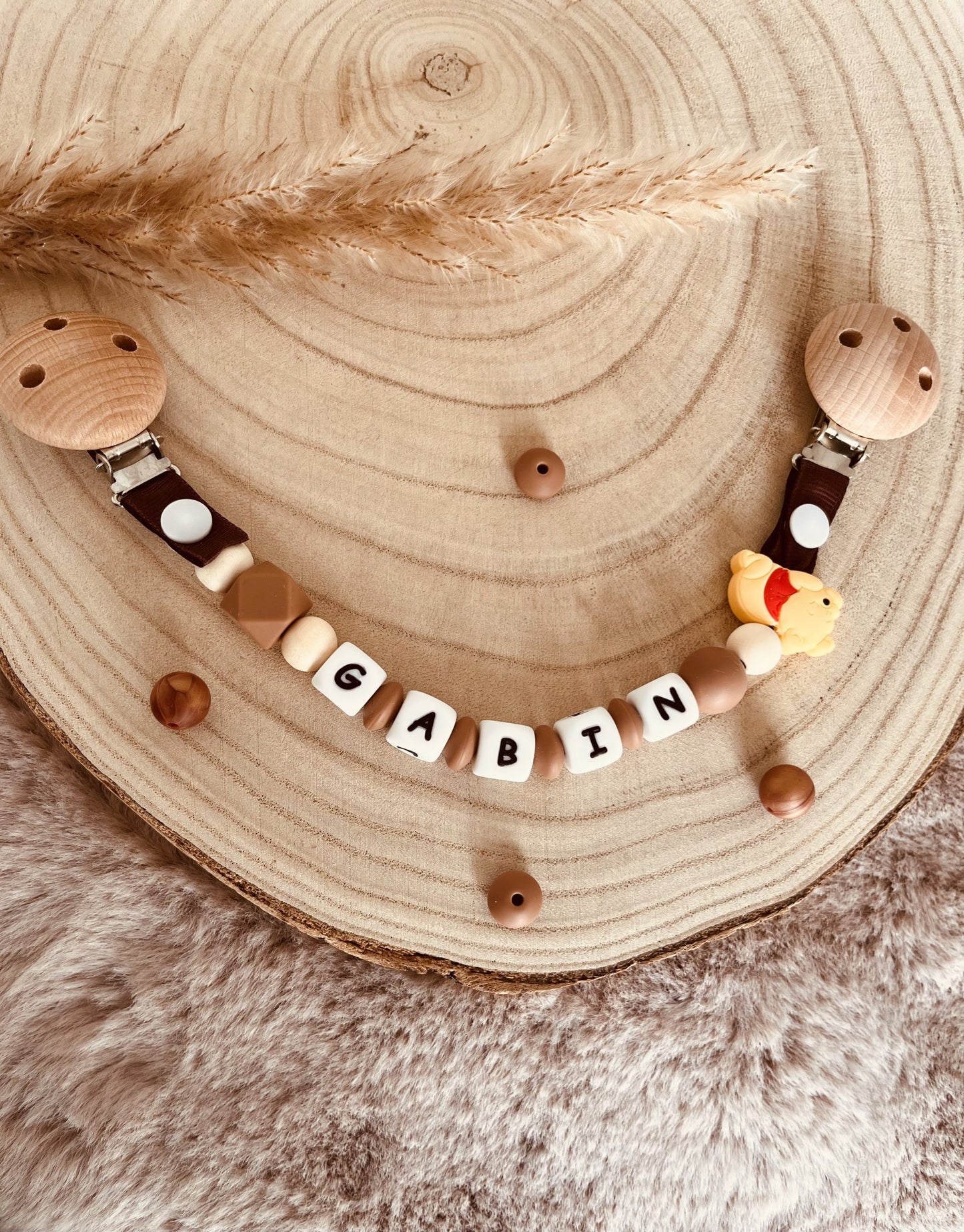 Attache doudou Winnie l'ourson