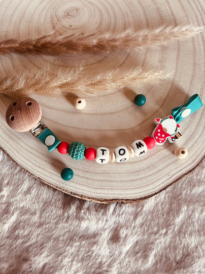Attache tétine lutin de noël