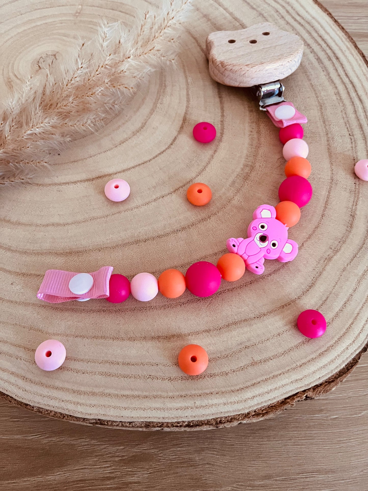 Attache tétine koala rose