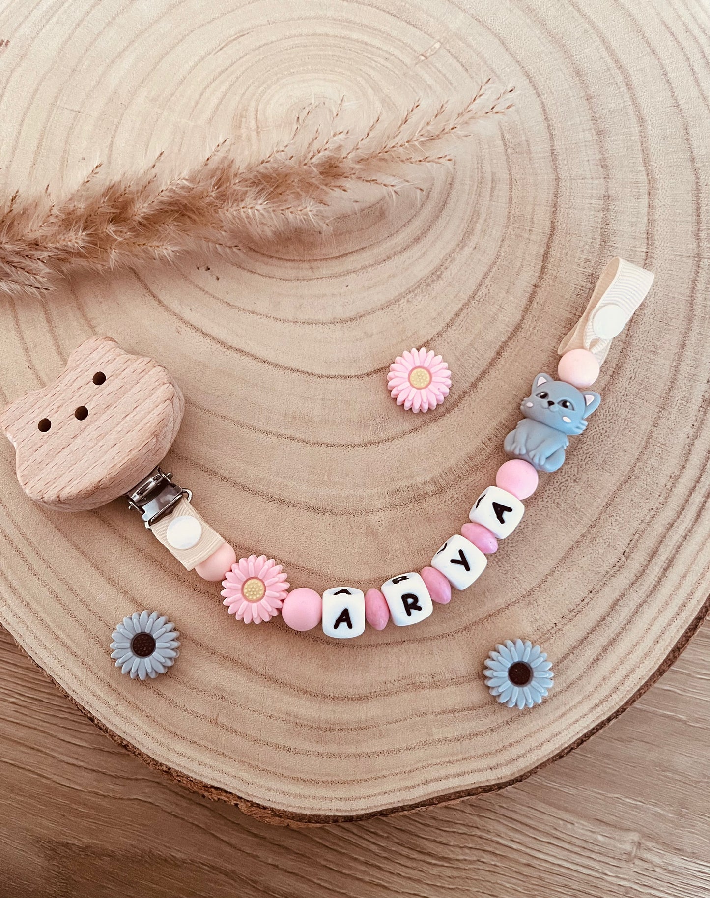 Pink chat pacifier attachment