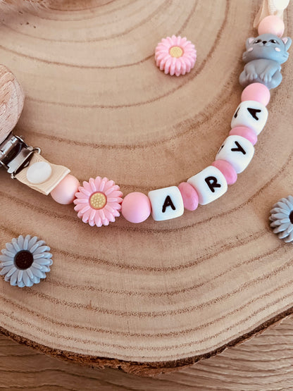 Pink chat pacifier attachment
