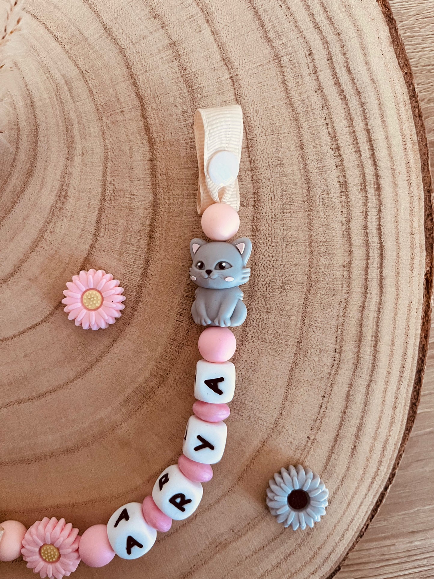 Pink chat pacifier attachment