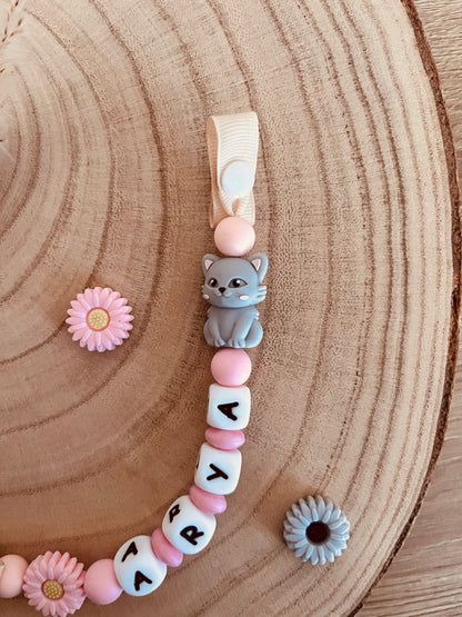 Pink chat pacifier attachment