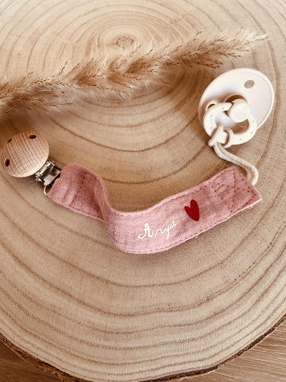 Pink cotton gauze pacifier attachment