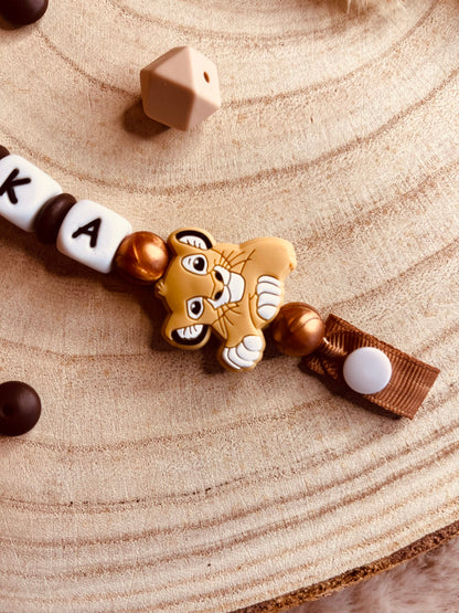 Attache tétine le roi lion simba