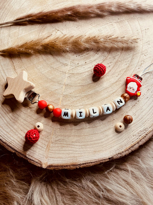 attache tétine père noel
