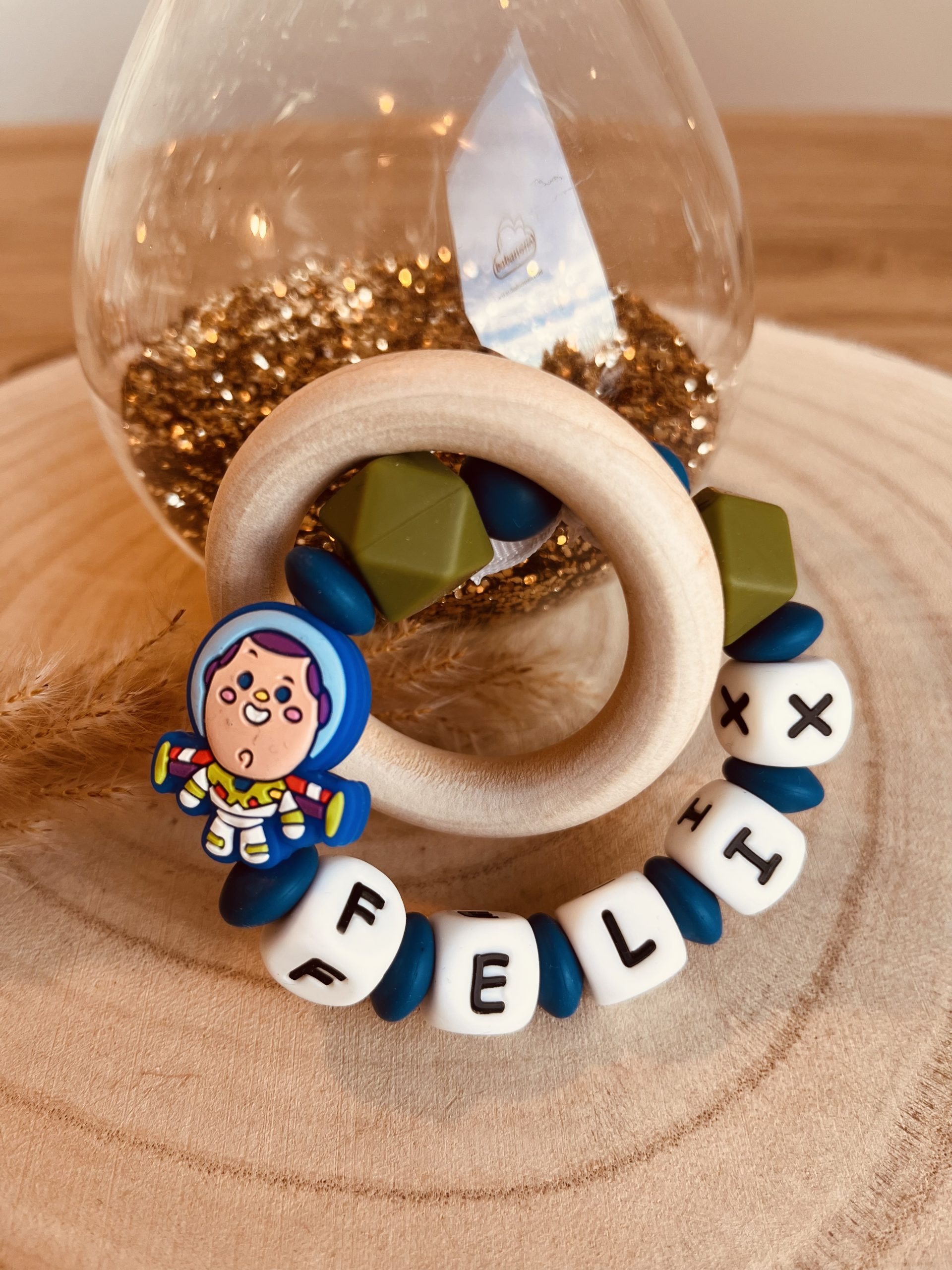 Customized Buzz Lightyear teething ring in wood and silicone