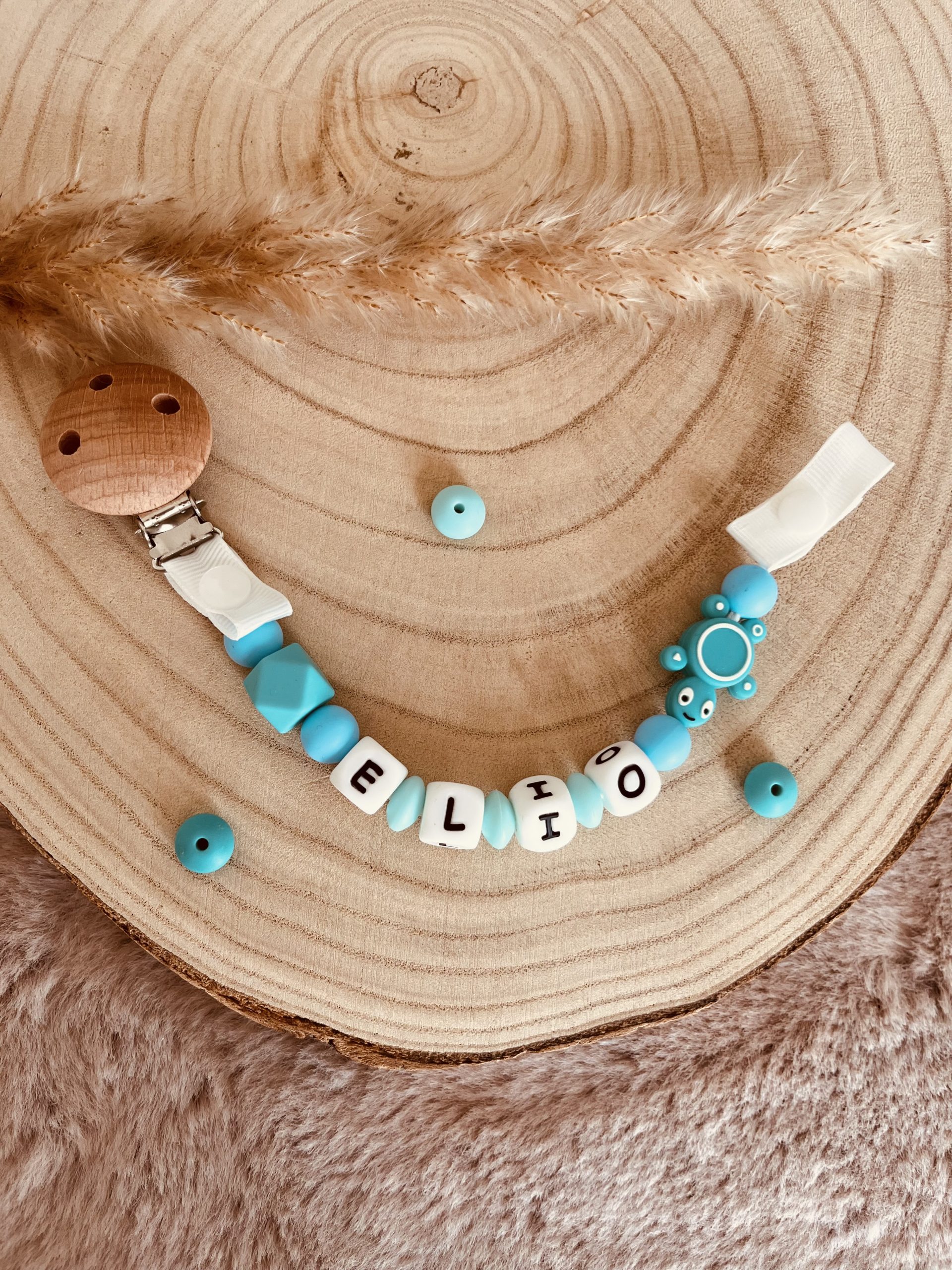 Attache tétine tortue turquoise