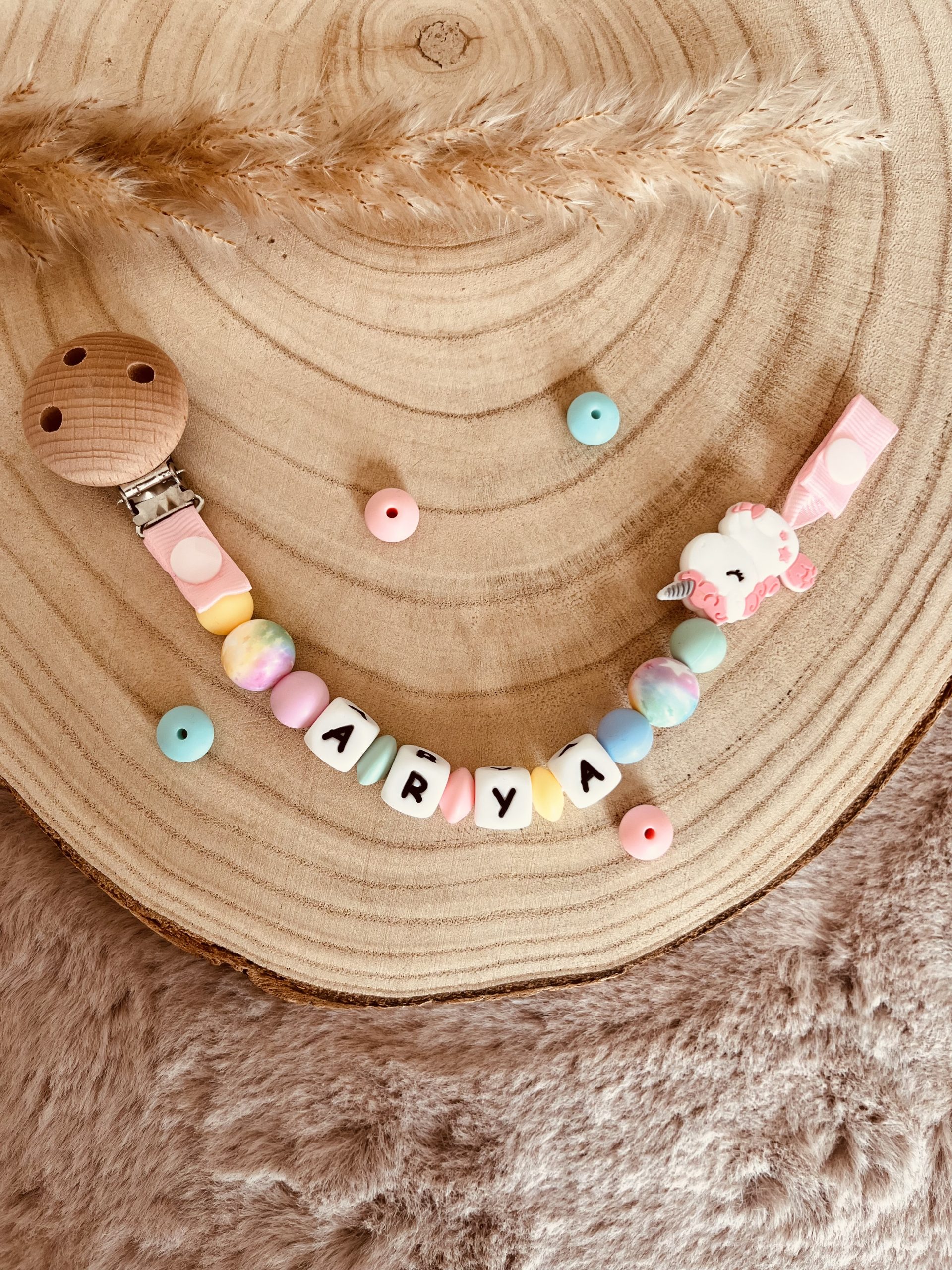 Attache tétine licorne pastel